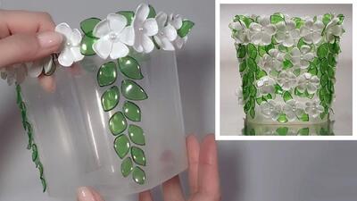 این گلدان از بطری های پلاستیکی رنگی ساخته شده است و از باران و آفتاب نمی ترسد!