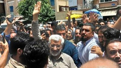 ببینید | واکنش تند مردم و فروشنده‌ها به حضور جلیلی در بازار تهران
