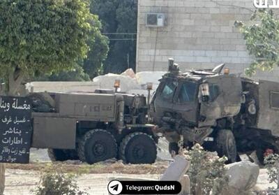 لحظه انفجار بمب در مسیر خودروی ارتش اسرائیل - تسنیم