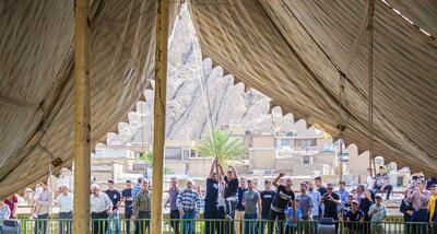 تصاویر| آیین سنتی برافراشتن خیمه‌های حسینی در زرقان فارس