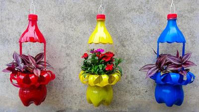 (ویدئو) فرآیند ساخت یک گلدان آویز زیبا برا تراس با بطری پلاستیکی