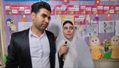 عروس و داماد دره‌شهری پای صندوق رای