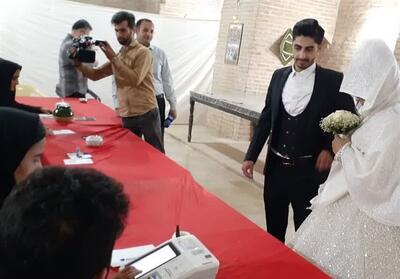 حضور عروس وداماد تربت جامی پای صندوق رای- فیلم دفاتر استانی تسنیم | Tasnim