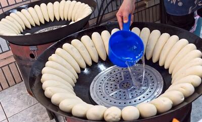 فرآیند دیدنی پخت «نان بخار پز» به روش سرآشپز چینی (فیلم)