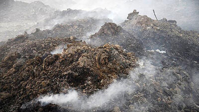 فیلم مهار آتش‌ سوزی در محل دفن زباله عمارت آمل