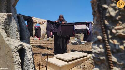 (تصاویر) زندگی آوارگان فلسطینی در گورستان