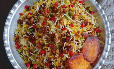 طرز تهیه گردو پلو با کشمش و مرغ؛ ناهاری خوشمزه و متفاوت