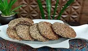 این کوکی کنجدی خونگی سالم و خوشمزه رو در یک چشم برهم زدن درست می‌کنی! | طرز تهیه کوکی کنجدی +ویدئو