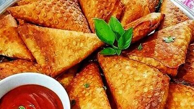 طرز تهیه سمبوسه خانگی به روش ساده با سس خوشمزه و لذیذ