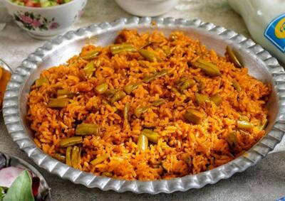 طرز تهیه لوبیا پلو مجلسی با گوشت و ته دیگ سیب زمینی (ویدئو)