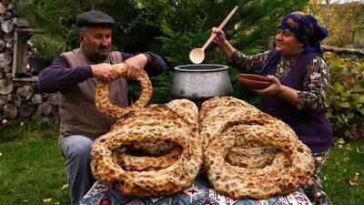 فرآیند پخت نان سنگک ترکی به روش زوج روستایی آذربایجانی (فیلم)