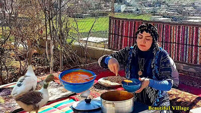 (ویدئو) فرآیند پخت آبگوشت و نان توسط بانوی روستایی زاگرس نشین