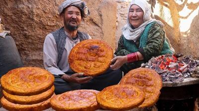 (ویدئو) پخت نان‌های سنتی بزرگ در افغانستان