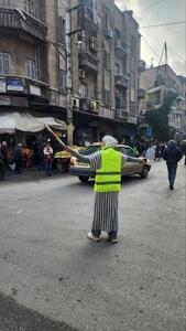 عکس| پلیس زن راهنمایی و رانندگی در حلب! | رویداد24