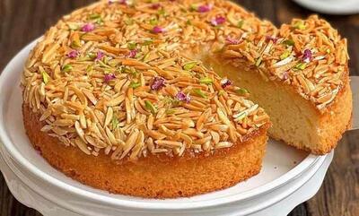 طرز تهیه کیک ملکه بادام برای عصرانه+ نکات و فوت‌وفن‌ ها