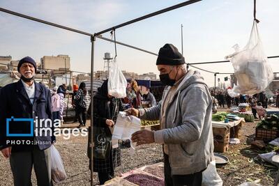 تصویر تختی و فردین در بازار «سیمون بولیوار»