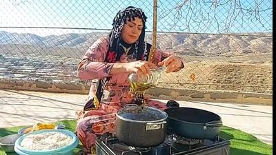 (ویدئو) غذای روستایی در ایران؛ پخت زرشک پلو با مرغ به روشی متفاوت