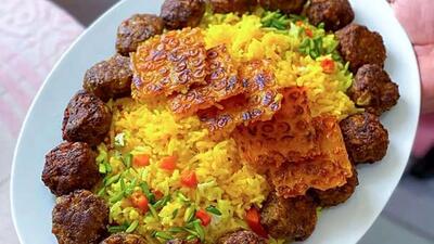 طرز تهیه زرشک پلو با گوشت قلقلی با خواص ضدالتهابی و تقویت‌ سیستم ایمنی