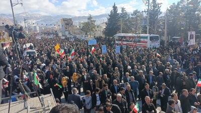 ترسیم پرچم پر افتخار جمهوری اسلامی ایران برچهره راهپیمایان ۲۲ بهمن در ایلام