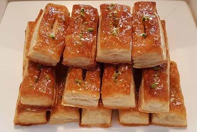 طرز تهیه شیرینی زبان خانگی خوشمزه با خمیر هزارلا به روش قنادی