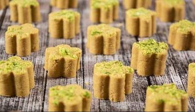 طرز تهیه شیرینی نخودچی شکری مخصوص نوروز