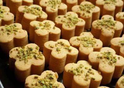 طرز تهیه شیرینی نخودچی شکری | اقتصاد24