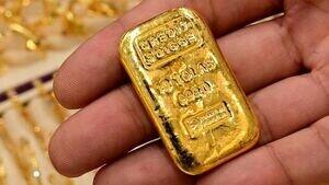 طلای جهانی با تقویت دلار عقب‌نشینی کرد