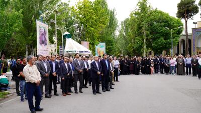 اهتزاز پرچم آستان قدس رضوی در دانشگاه علم و صنعت