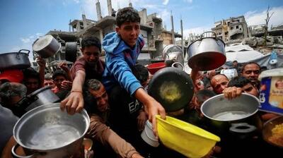توزیع غذا بین گرسنگان و آورگان غزه