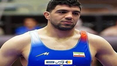 مدال برنز رقابت‌های بین المللی جام تختی برگردن کشتی‌گیر کرمانشاهی