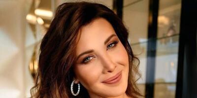 قاب عاشقانه نانسی عجرم و همسرش در دبی