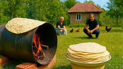 روش سنتی پخت نان لواش روی بشکه در دل طبیعت (فیلم)