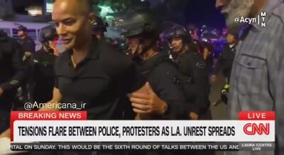 در جریان اعتراضات لس‌آنجلس،  خبرنگار CNN بازداشت شد!/فیلم