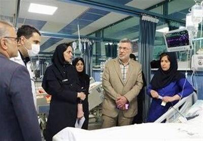 عیادت وزیر بهداشت از مجروحان حمله رژیم صهیونیستی در تهران - تسنیم