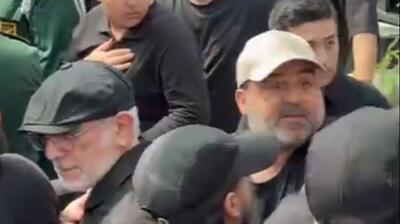 سردار قاآنی و همسرش در مراسم تشییع پیکر شهیدان باقری و حاجی‌زاده (فیلم)