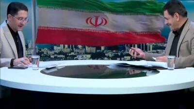 واکنش جالب مجری شبکه خبر به زنگ خوردن تلفن مهمان در برنامه زنده (فیلم)