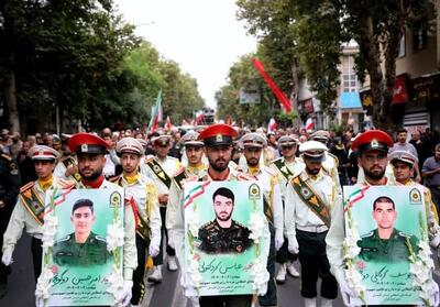 وقتی گلستان 2 شهید اهل سنت را به آغوش کشید + فیلم و تصاویر - تسنیم