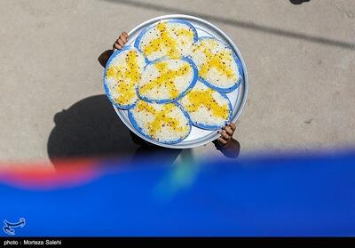 تصاویر: آیین سنتی توزیع نذری در روستای بارچان-اصفهان