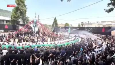 آیین سنتی کمر به کمر رامیانی‌ها در عاشورای حسینی + فیلم