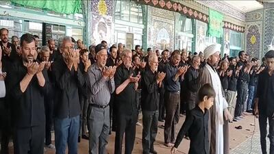 اقامه نماز ظهر عاشورا با حضور عزاداران حسینی در شهر عسگران + فیلم
