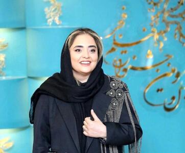 نگاه روز | چیدمان منحصربفرد خانه  نرگس محمدی  تزیین شده با گل ارکیده سفید