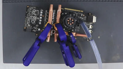 وقتی GTX 1060 با چند تکه لوله مسی و آب یخ جهانی شد!