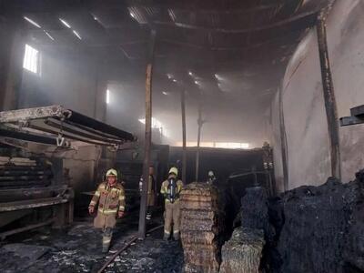 آتش‌سوزی یک کارگاه انبار پارچه در جاده ورامین