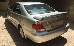 مزایده خرید خودروی  دولتی تویوتا کمری  رنگ : نقره ای  مدل : 2006