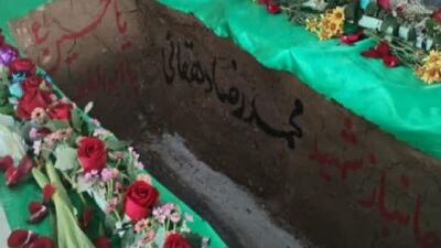 پیکر مطهر جانباز ۷۰ درصد شهید محمدرضا دهقانی در خاک آرام گرفت + تصاویر
