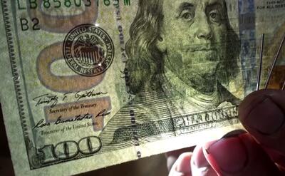 تشخیص دلار اصل از تقلبی با یک آهن‌ربای ساده