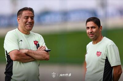 گزترش تصویری| توصیه‌های هاشمیان در تمرین بارانی پرسپولیس!