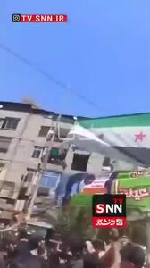 پایین کشیدن پرچم حکومت جولانی توسط دروزی‌ها در حومه دمشق
