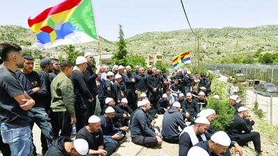 نمایش پرچم دروزی‌ها در آسمان جولان اشغالی توسط بالگرد صهیونیست‌ها + ویدئو