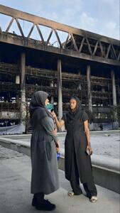 عکس/ مصاحبه خبرنگار آمریکایی با خبرنگار صدوسیما درباره حمله اسرائیل